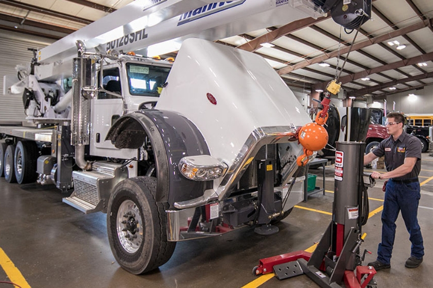 Technician working on truck