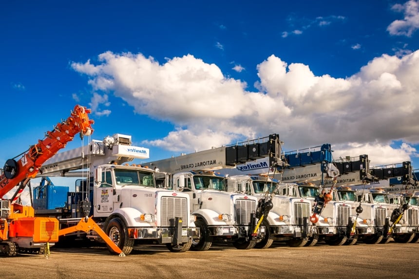 Line up of crane trucks at Rush Crane Systems