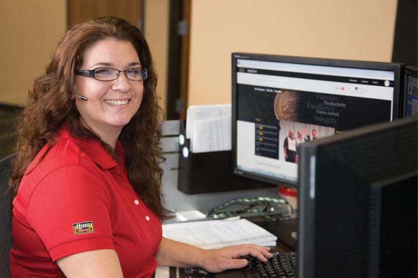 RushCare Call Center employee sitting at desk