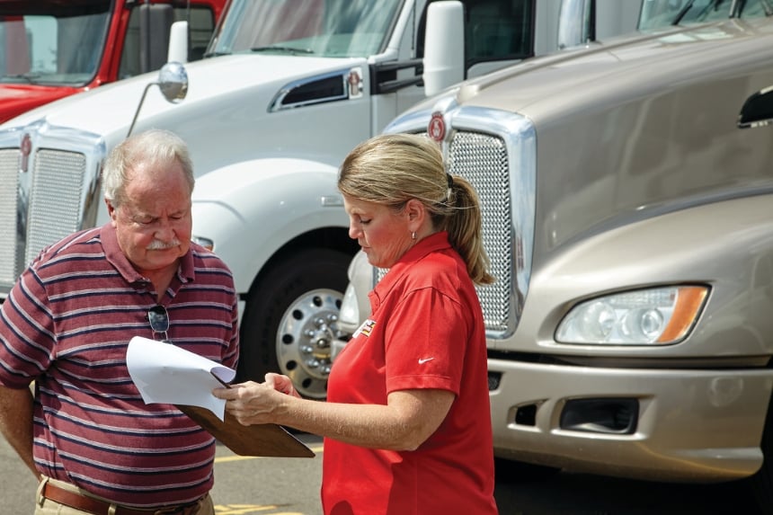 Rush Truck Leasing employee talking to customer